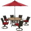 Hanover Monaco 7 pc. Dining Set with 6 Wicker Back Swivel Rockers, 60 in. Table, 9 ft. Umbrella, Red, MONDNWB7PCSW6RDTL-SU-R -Hanover Sales 1715081