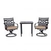 Hanover Montclair 3 pc. Bistro Dining Set in Tan with 2 Swivel Rockers and a 27 in. Square Table, MCLRDN3PCSW2-TAN -Hanover Sales 1738492
